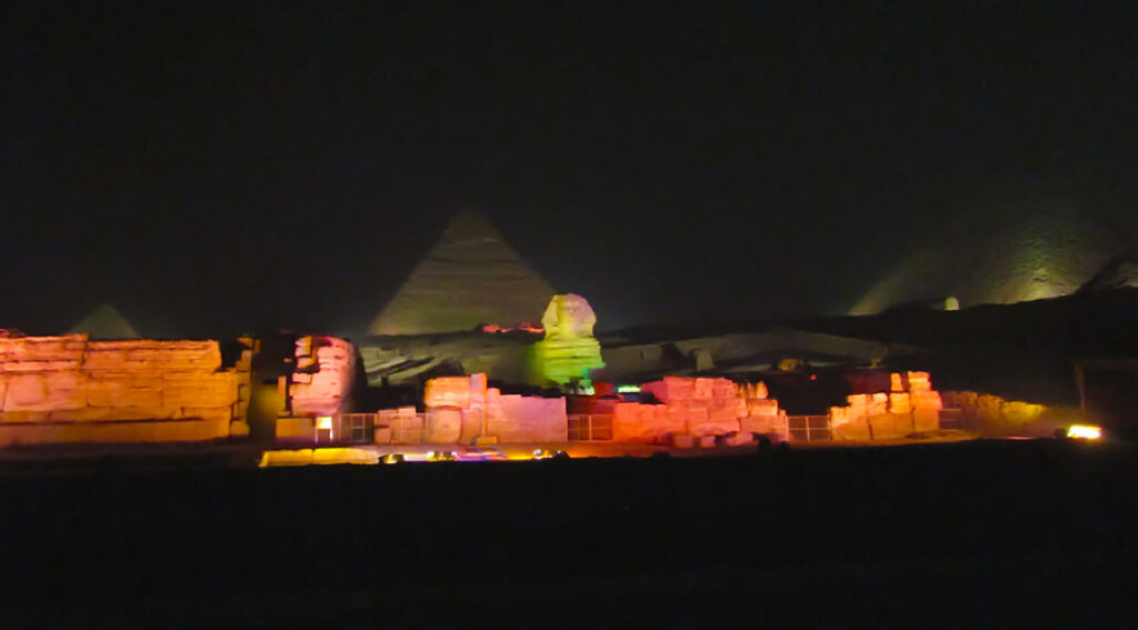 The Great Pyramid Complex illuminated by colored lights. If you have a tripod for your camera, bring it with you.