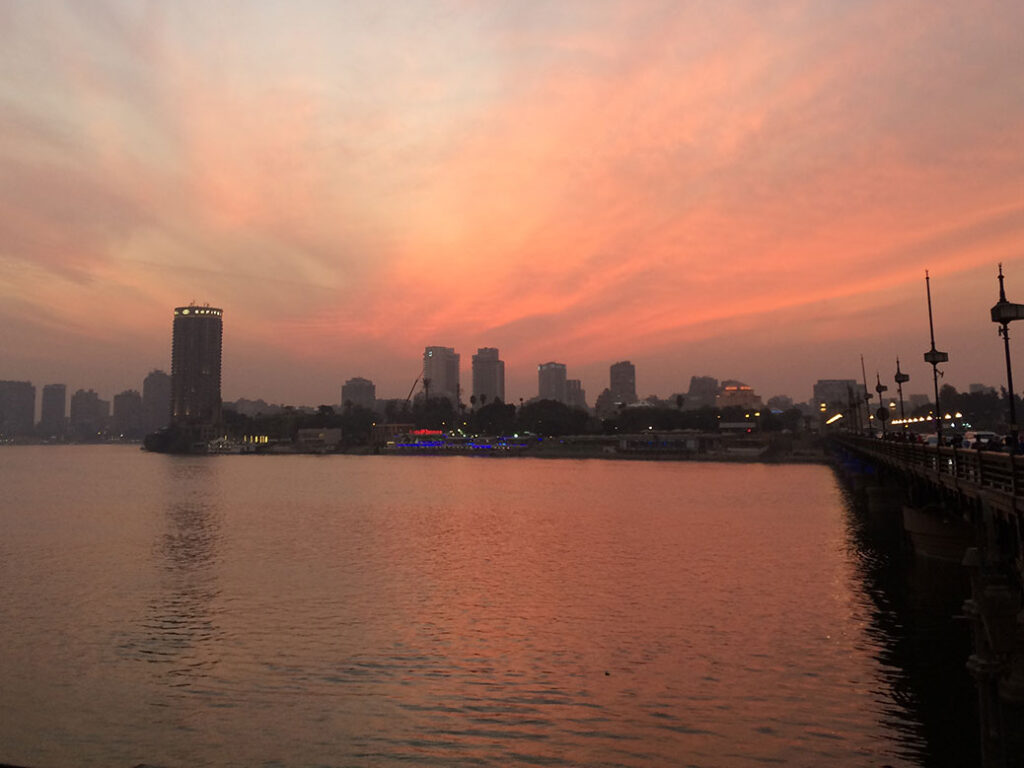 Sunset over the Nile River from the east end of the Qasr El Nil Bridge.