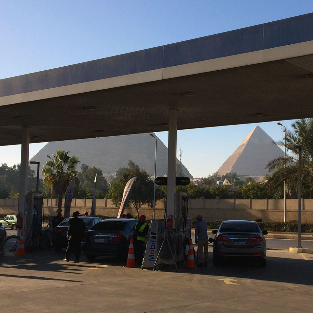 Our first up-close glimpse of the Pyramids came from a gas station... pretty good view while filling up the tank.