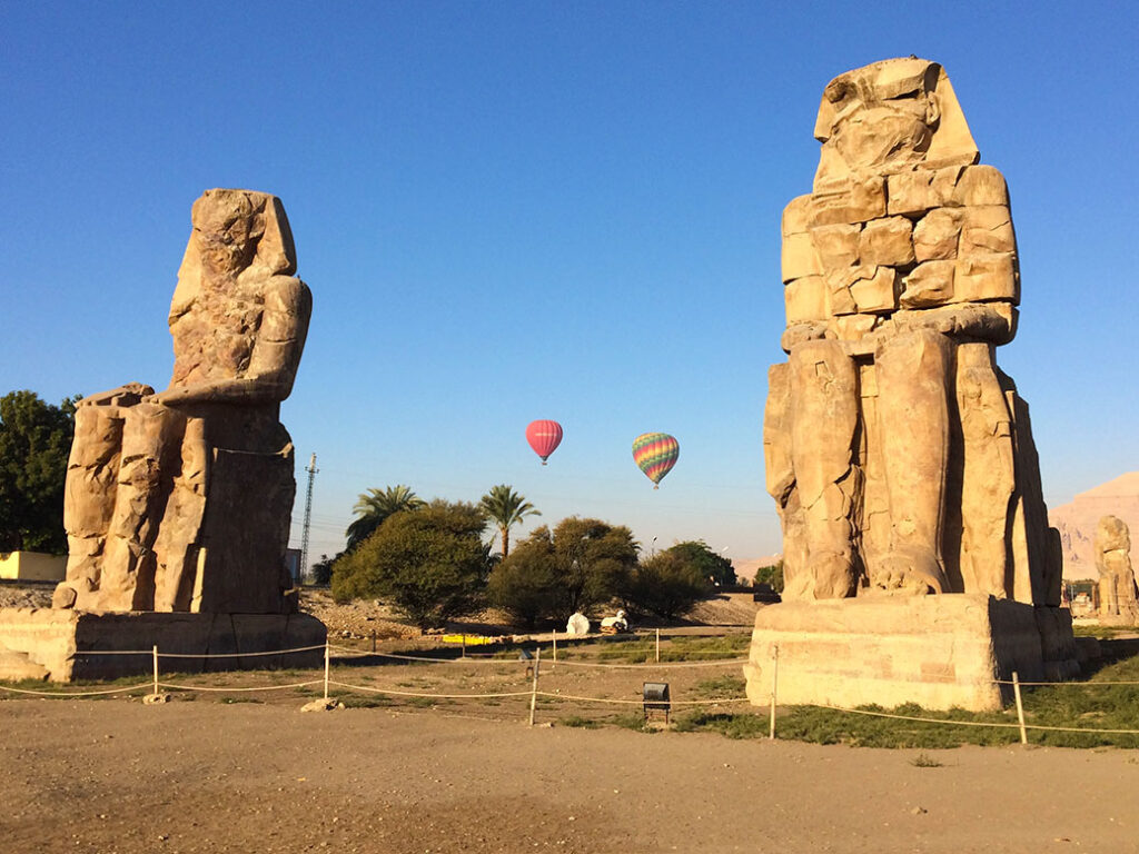 The twin statues of Pharaoh Amenhotep III known as the Colossi of Memnon in Luxor.