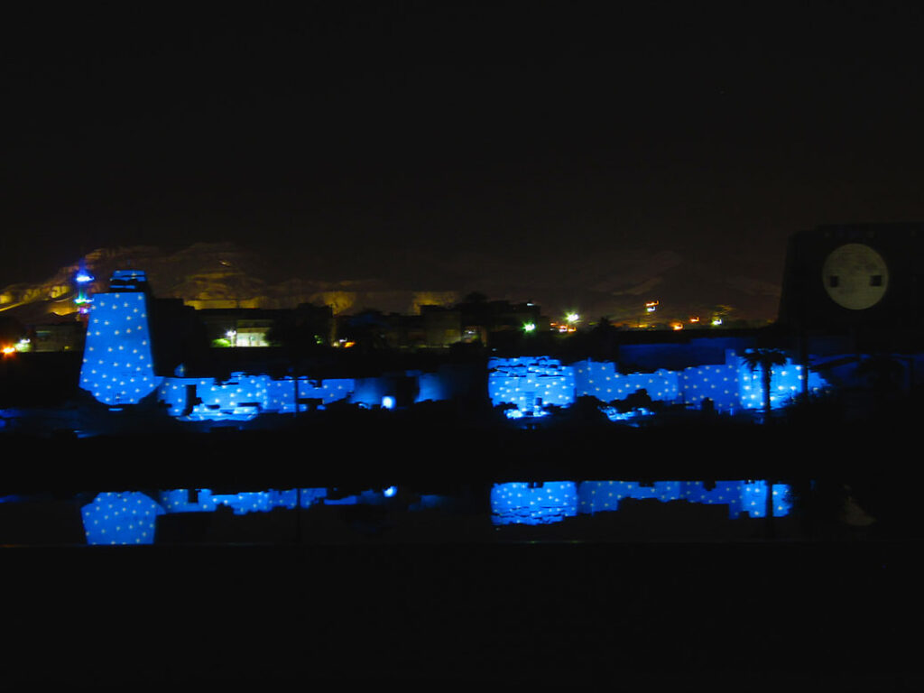 The Sound and Light Show at Karnak Temple reflects on the Sacred Lake.