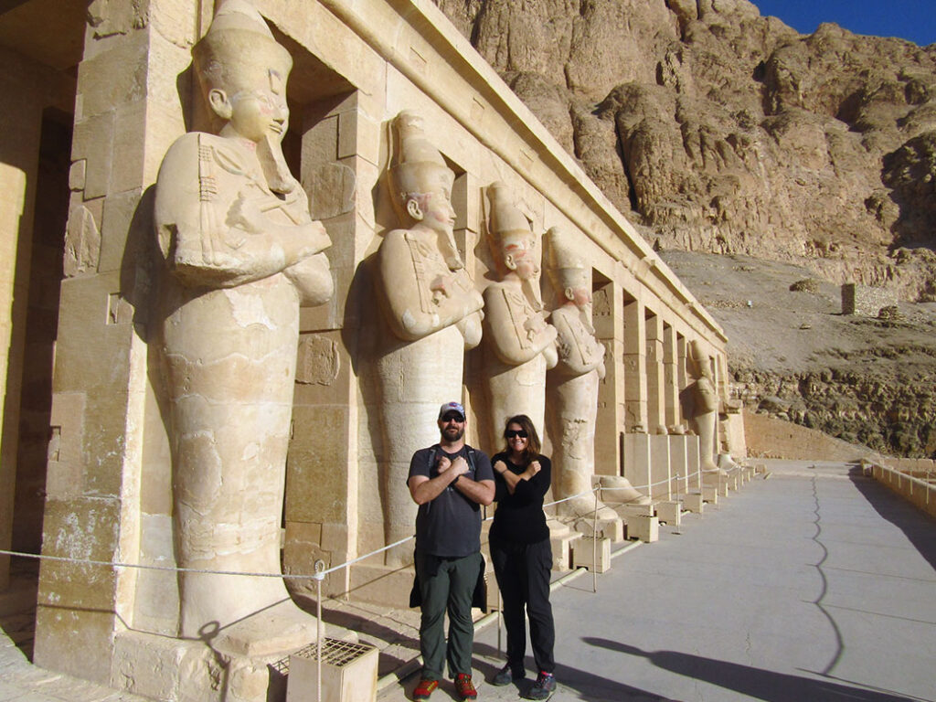 Standing with the statues outside of Hatshepsut Temple.